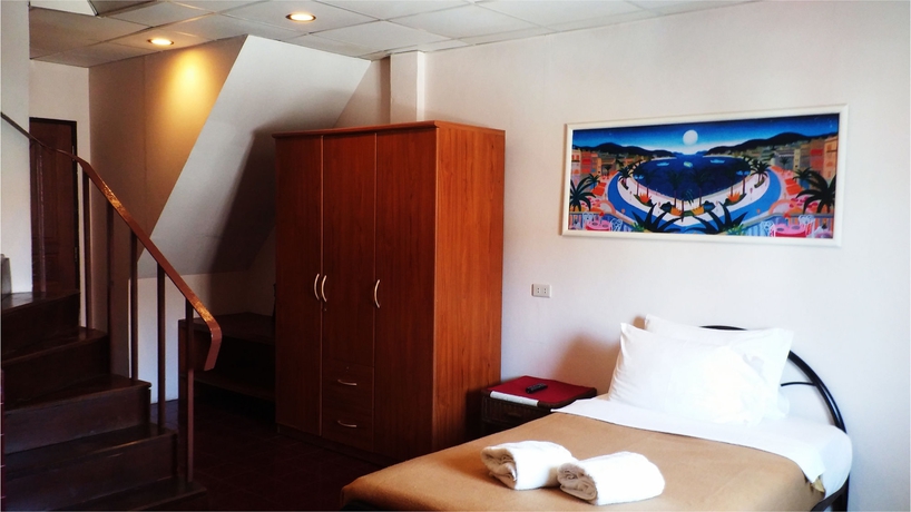 Imagen de la habitación del Hotel Karon Café Inn. Foto 9