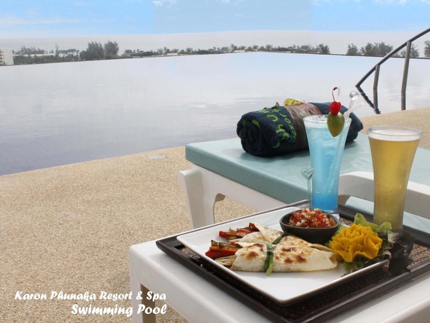 Imagen de la piscina del Hotel Karon Phunaka Resort. Foto 16