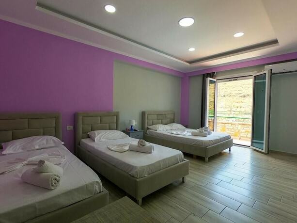 Imagen de la habitación del Hotel Karos Llaman. Foto 11