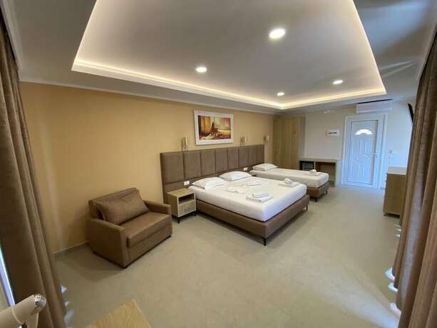 Imagen de la habitación del Hotel Karos Llaman. Foto 13