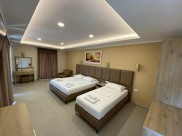 Imagen de la habitación del Hotel Karos Llaman. Foto 16