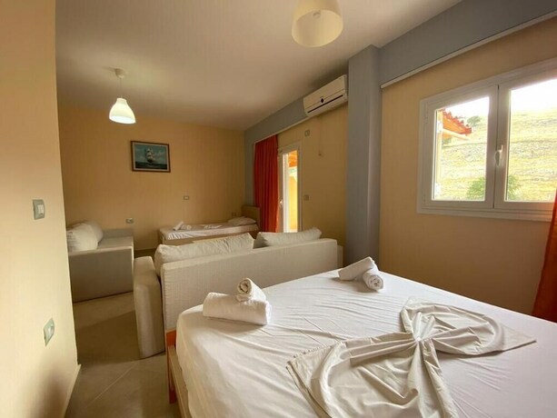Imagen de la habitación del Hotel Karos Llaman. Foto 17