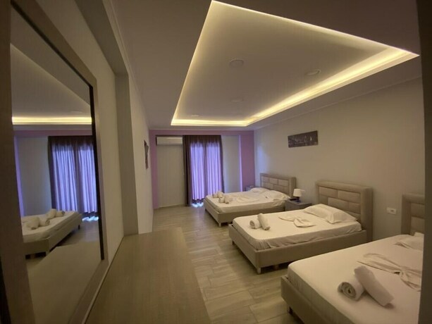 Imagen de la habitación del Hotel Karos Llaman. Foto 18