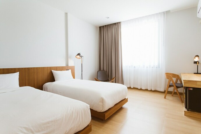 Imagen de la habitación del Hotel Karpenter Lampang. Foto 17