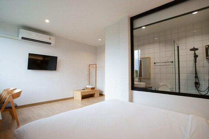 Imagen de la habitación del Hotel Karpenter Lampang. Foto 18
