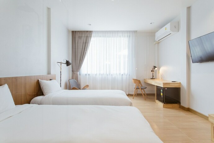 Imagen de la habitación del Hotel Karpenter Lampang. Foto 22