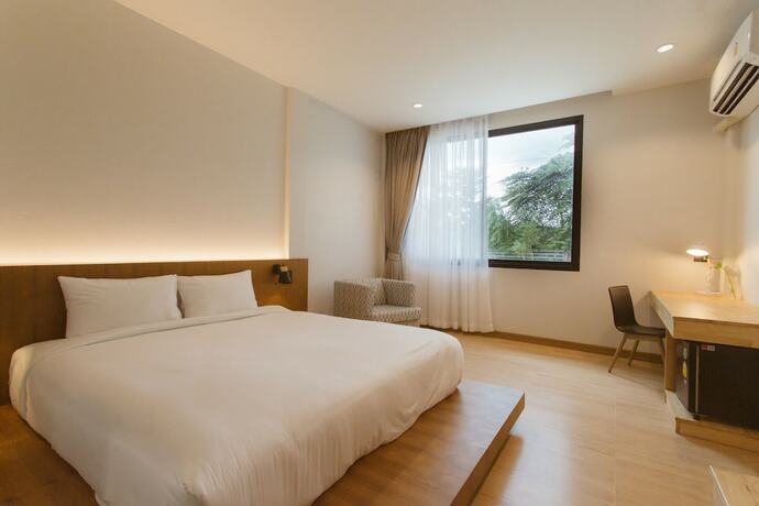 Imagen de la habitación del Hotel Karpenter Lampang. Foto 23