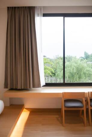 Imagen de la habitación del Hotel Karpenter Lampang. Foto 24
