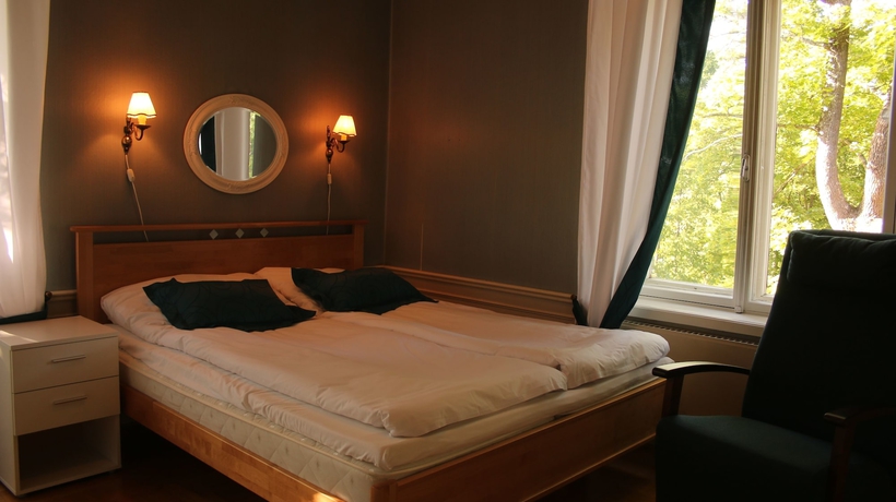 Imagen de la habitación del Hotel Kartanohotelli Karhulan Hovi. Foto 7