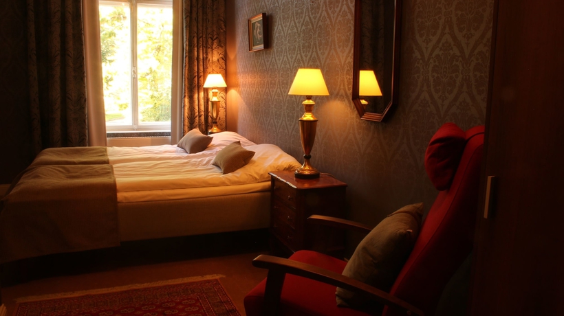 Imagen de la habitación del Hotel Kartanohotelli Karhulan Hovi. Foto 8