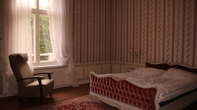 Imagen de la habitación del Hotel Kartanohotelli Karhulan Hovi. Foto 9