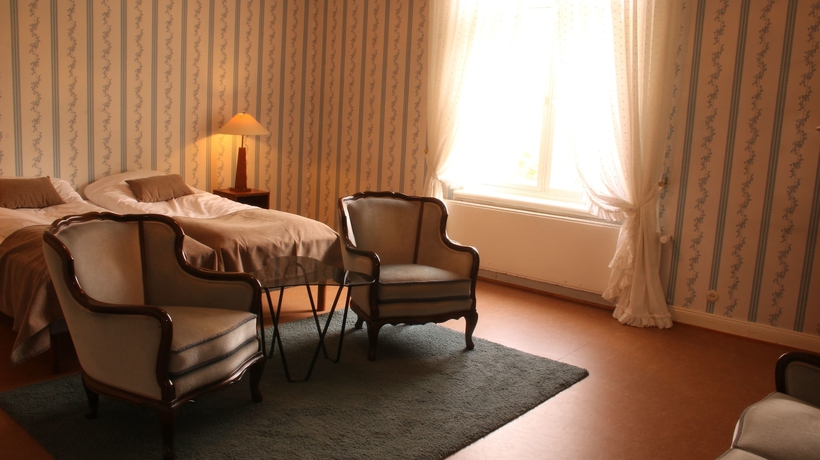 Imagen de la habitación del Hotel Kartanohotelli Karhulan Hovi. Foto 10