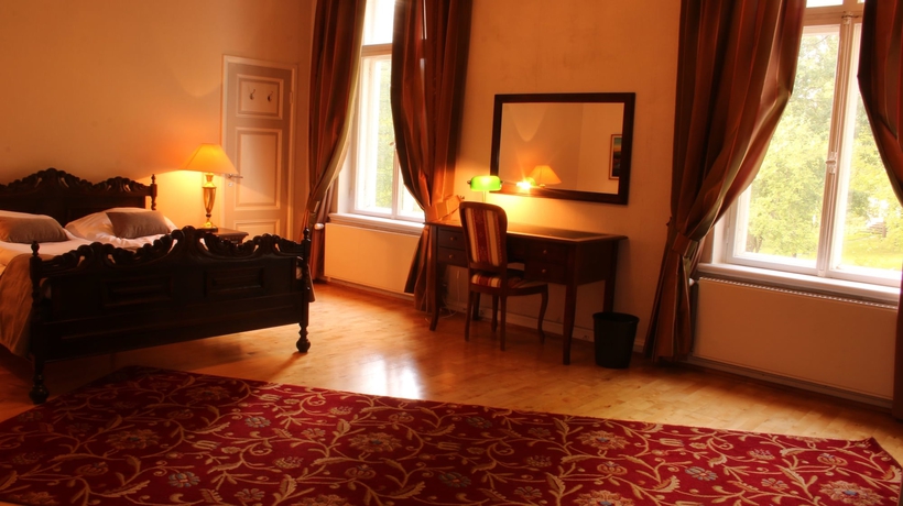 Imagen de la habitación del Hotel Kartanohotelli Karhulan Hovi. Foto 11