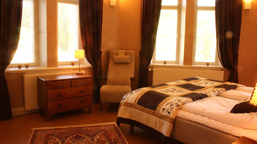Imagen de la habitación del Hotel Kartanohotelli Karhulan Hovi. Foto 12