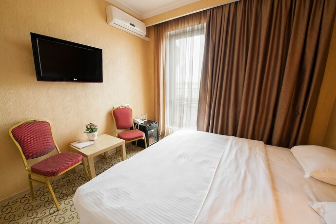 Imagen de la habitación del Hotel Kartmazovo Town. Foto 17