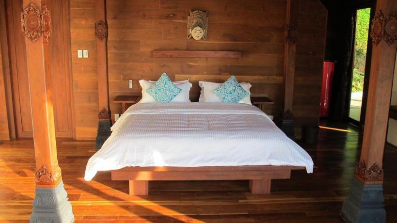 Imagen de la habitación del Hotel Karuna El Nido Villas. Foto 8