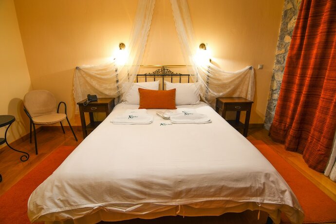 Imagen de la habitación del Hotel Karyatis Resort. Foto 11