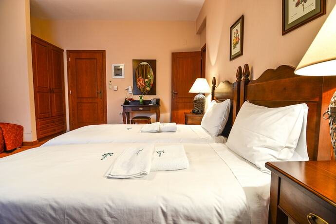 Imagen de la habitación del Hotel Karyatis Resort. Foto 13