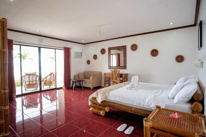 Imagen de la habitación del Hotel Kasai Village Dive Resort. Foto 15