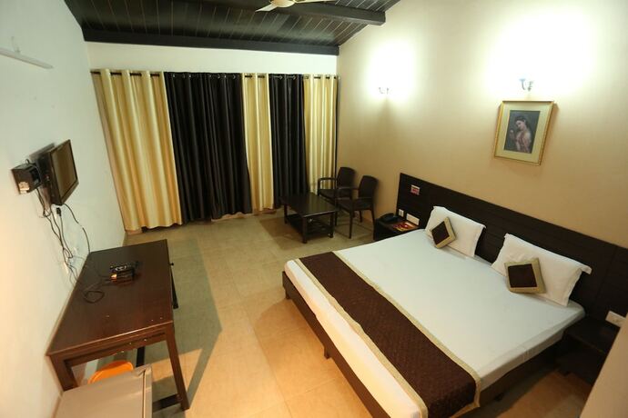 Imagen de la habitación del Hotel Kasang Regency Hill Resort. Foto 27