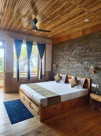 Imagen de la habitación del Hotel Kasar Hill Top. Foto 6