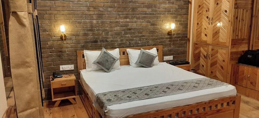 Imagen de la habitación del Hotel Kasar Hill Top. Foto 9