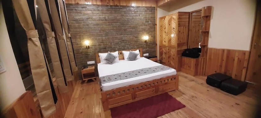 Imagen de la habitación del Hotel Kasar Hill Top. Foto 10