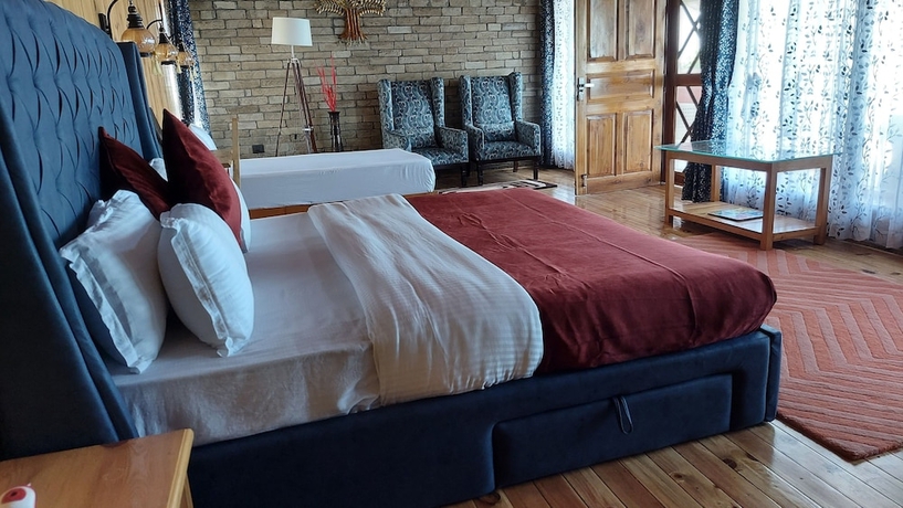 Imagen de la habitación del Hotel Kasar Himalaya Holiday Home. Foto 2