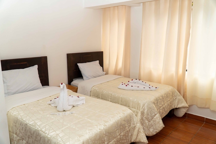 Imagen de la habitación del Hotel Kasas del Inka Machupicchu. Foto 16