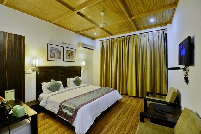 Imagen de la habitación del Hotel Kasauli Exotica. Foto 17