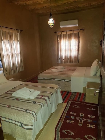 Imagen de la habitación del Hotel Kasbah Ait Benhadda. Foto 9