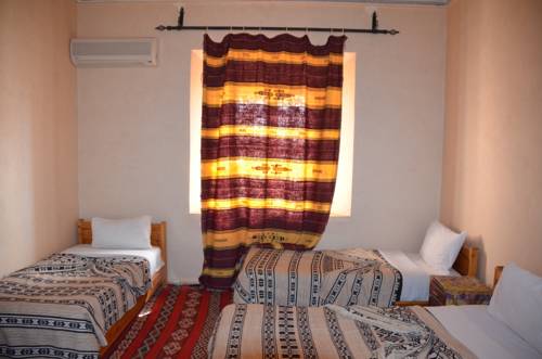 Imagen de la habitación del Hotel Kasbah Tizzarouine. Foto 13