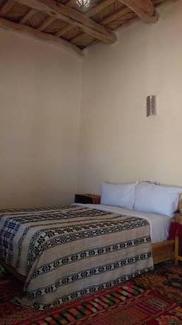 Imagen de la habitación del Hotel Kasbah Tizzarouine. Foto 14