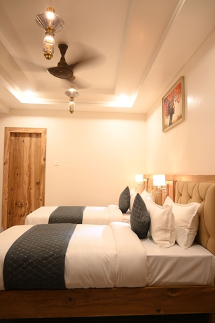 Imagen de la habitación del Hotel Kashi Crown. Foto 10