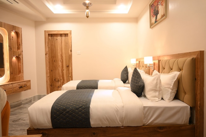 Imagen de la habitación del Hotel Kashi Crown. Foto 11