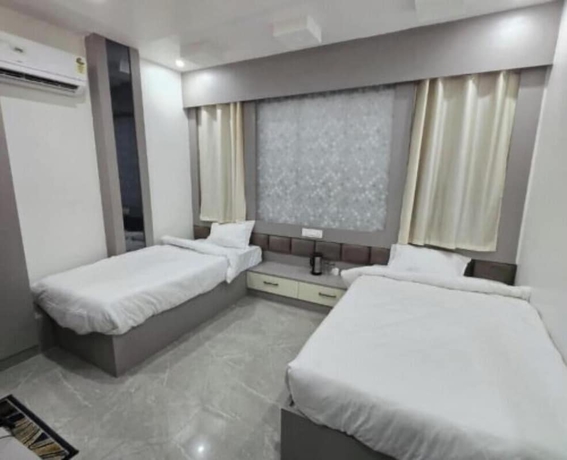 Imagen de la habitación del Hotel Kashi Ganga Inn. Foto 5