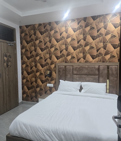 Imagen de la habitación del Hotel Kashi Ganga Inn. Foto 7
