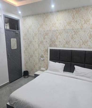Imagen de la habitación del Hotel Kashi Ganga Inn. Foto 9