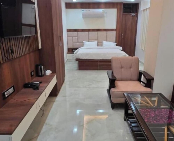 Imagen de la habitación del Hotel Kashi Ganga Inn. Foto 11