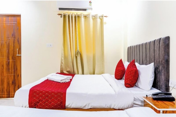 Imagen de la habitación del Hotel Kashi Grand Inn. Foto 10