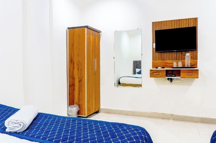 Imagen de la habitación del Hotel Kashi Grand Inn. Foto 13