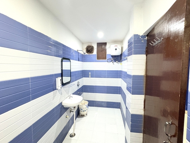 Imagen de la habitación del Hotel Kashi Residency Varanasi. Foto 11