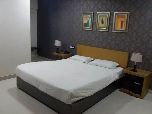 Imagen de la habitación del Hotel Kasturi International. Foto 14