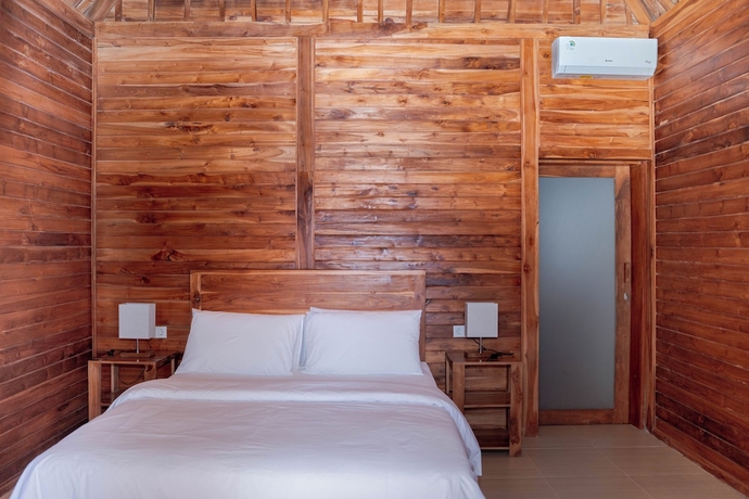 Imagen de la habitación del Hotel Kasturi Uluwatu. Foto 1