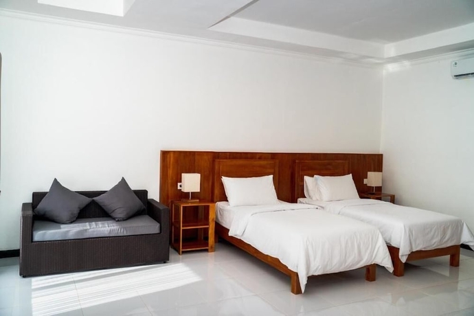 Imagen de la habitación del Hotel Kasturi Uluwatu. Foto 4