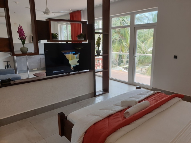 Imagen de la habitación del Hotel Kasumai Beach Resort. Foto 6