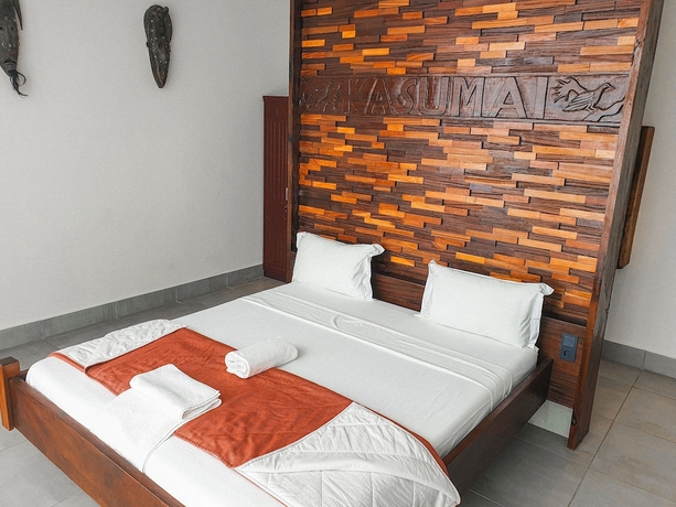 Imagen de la habitación del Hotel Kasumai Beach Resort. Foto 8