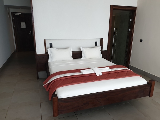 Imagen de la habitación del Hotel Kasumai Beach Resort. Foto 10