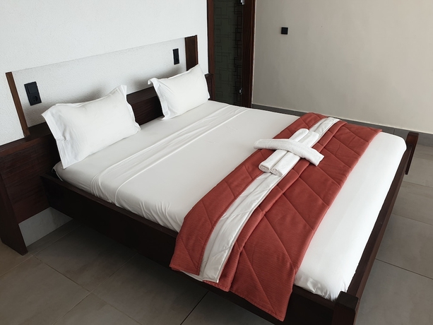 Imagen de la habitación del Hotel Kasumai Beach Resort. Foto 11