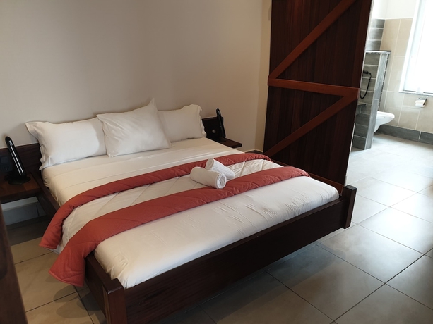 Imagen de la habitación del Hotel Kasumai Beach Resort. Foto 13